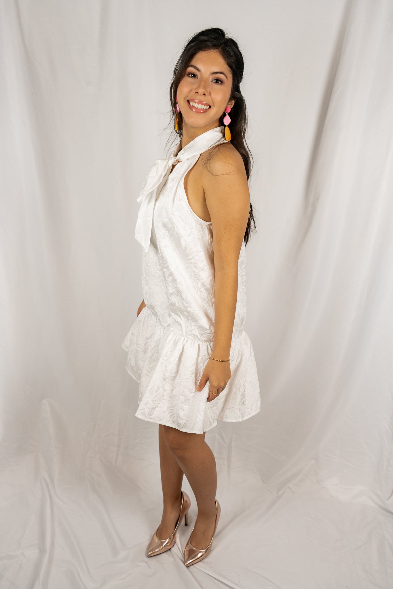 Textured adjustable neck bow dress